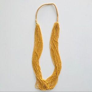 Yellow beaded necklace
